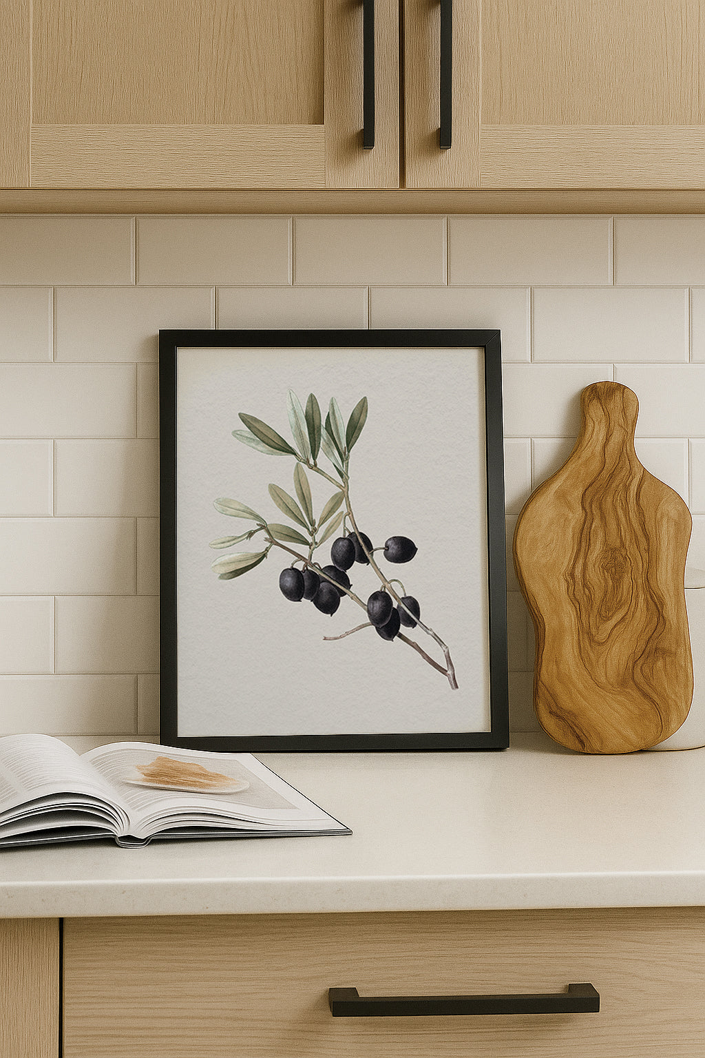 Kitchen setting with a vintage botanical olive print in black solid oak frame.