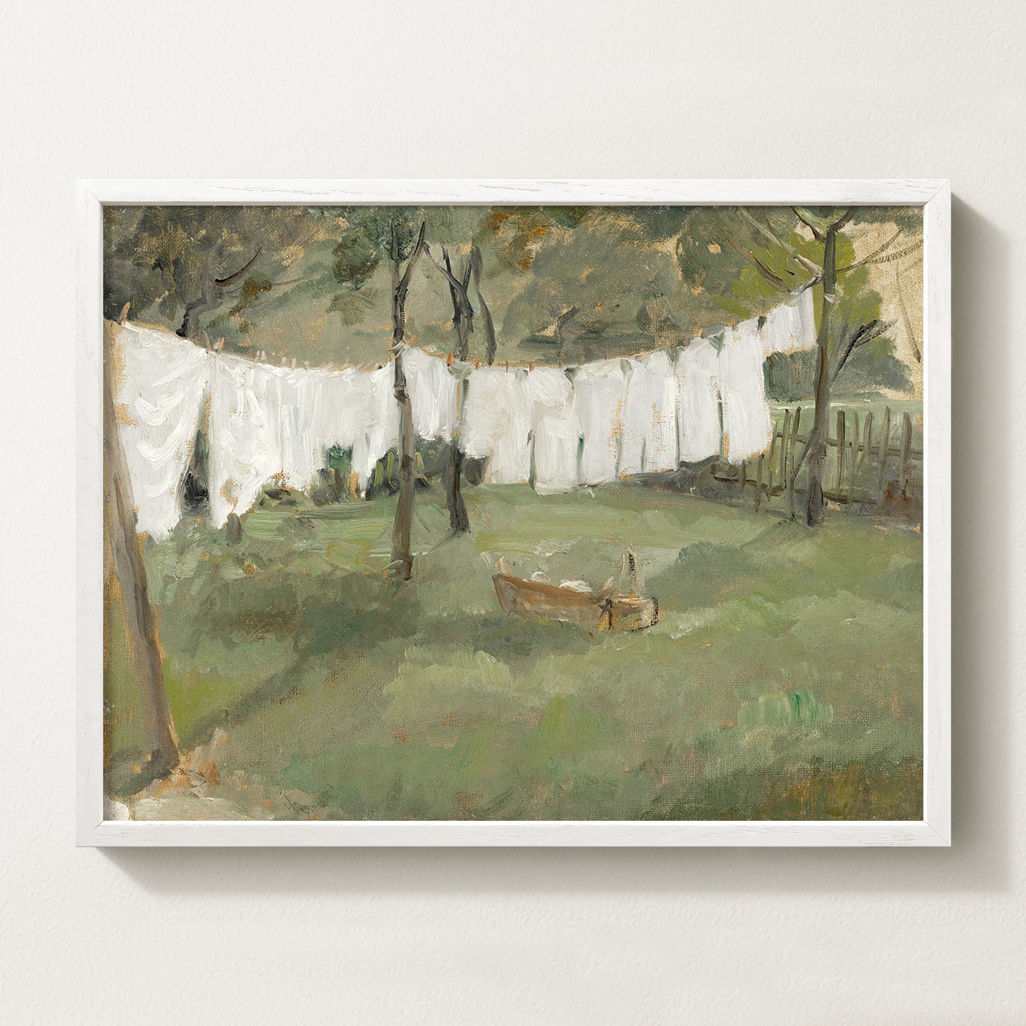 Vintage countryside landscape wall art in a white solid wood frame featuring laundry drying outdoors, ideal for farmhouse laundry rooms, cottage homes, and French country decor.