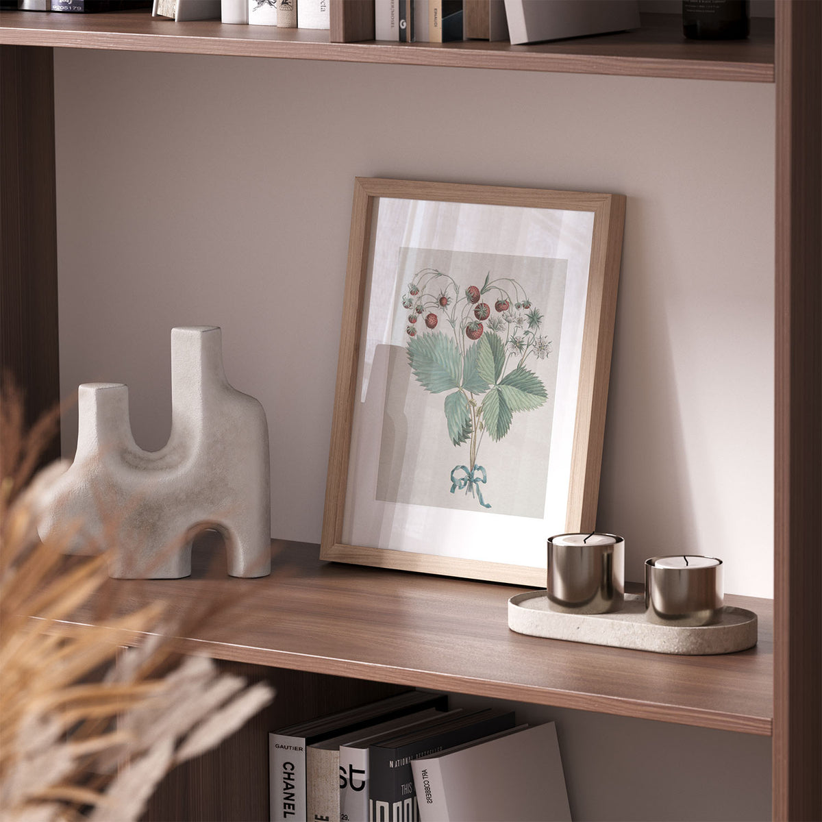 Framed vintage art print in a natural oak frame styled on a shelf with a ceramic vase and dried grasses, Avery Home