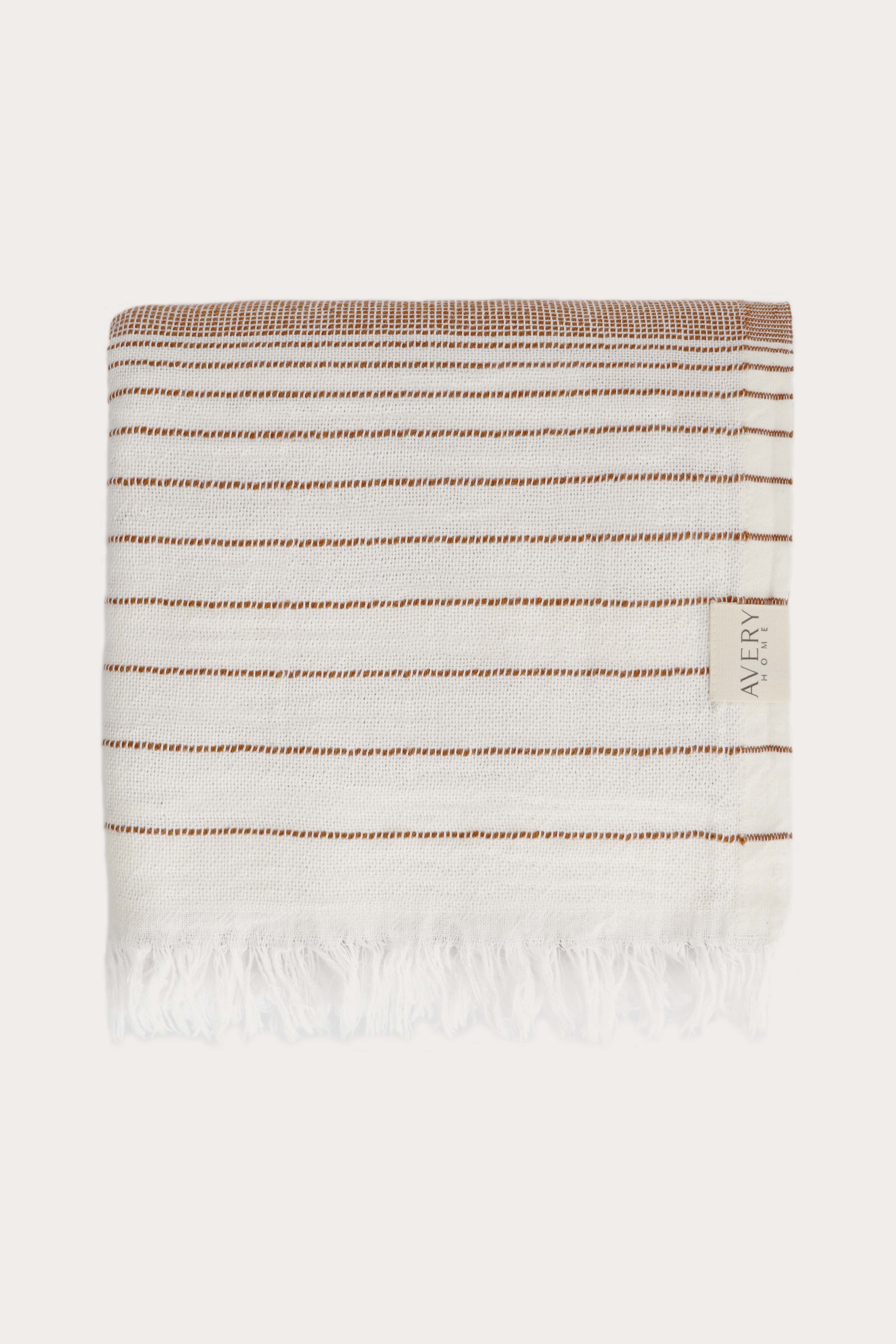 Avery Home terracotta stripe peshtemal folded, sustainable Turkish towel in recycled cotton and recycled polyester blend, lightweight and fast-drying