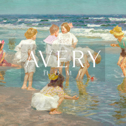 Framed vintage kids beach scene art print featuring children in white clothing playing by the shore with waves in the background.