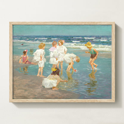 Framed vintage kids beach scene art print featuring children in white clothing playing by the shore with waves in the background.