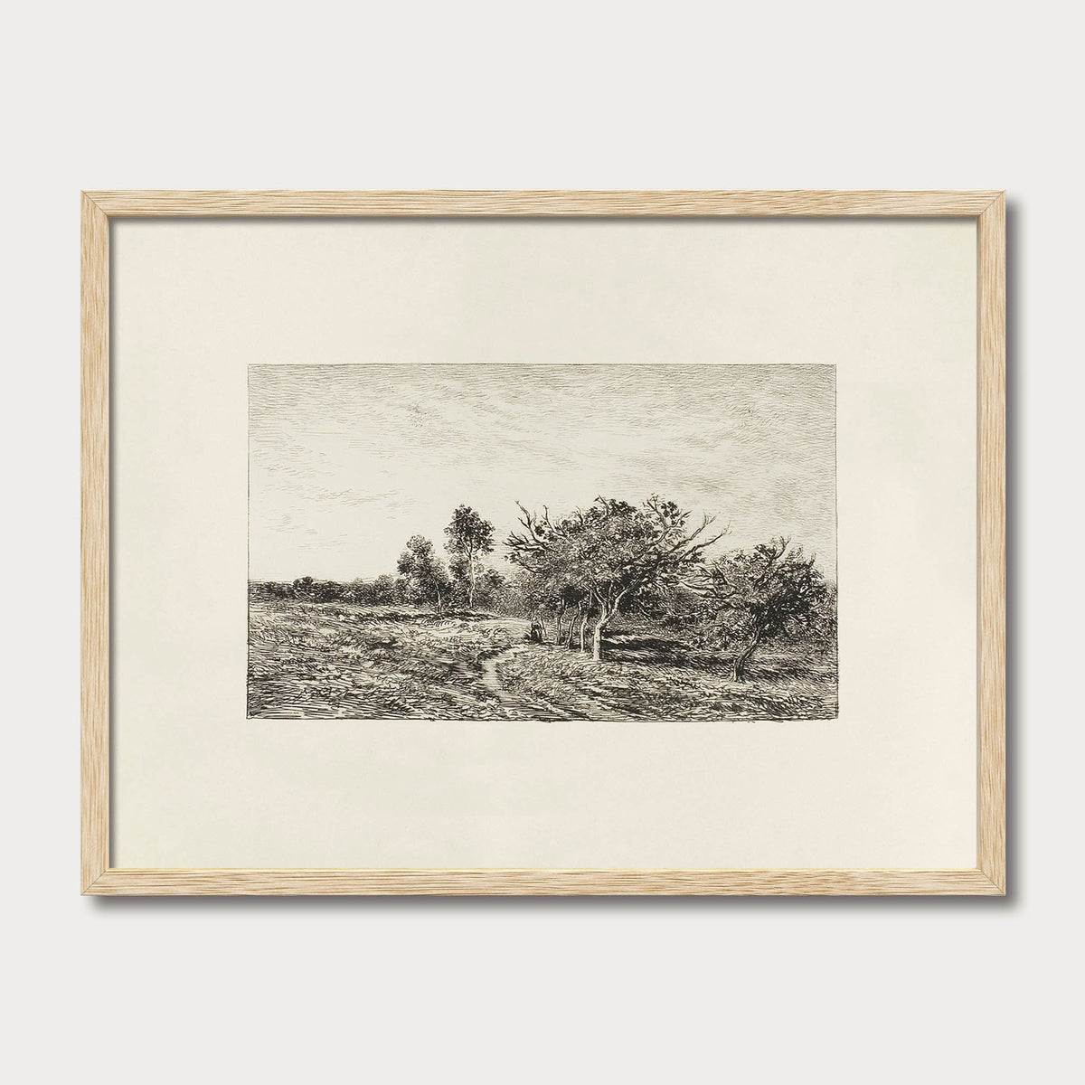 Antique orchard landscape print in a natural oak frame, ideal for French country kitchens and rustic interiors.