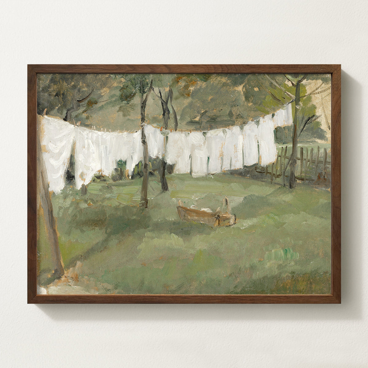 Neutral vintage countryside wall art in a walnut solid wood frame with a peaceful laundry line landscape, perfect for farmhouse, cottagecore, and rustic interiors.