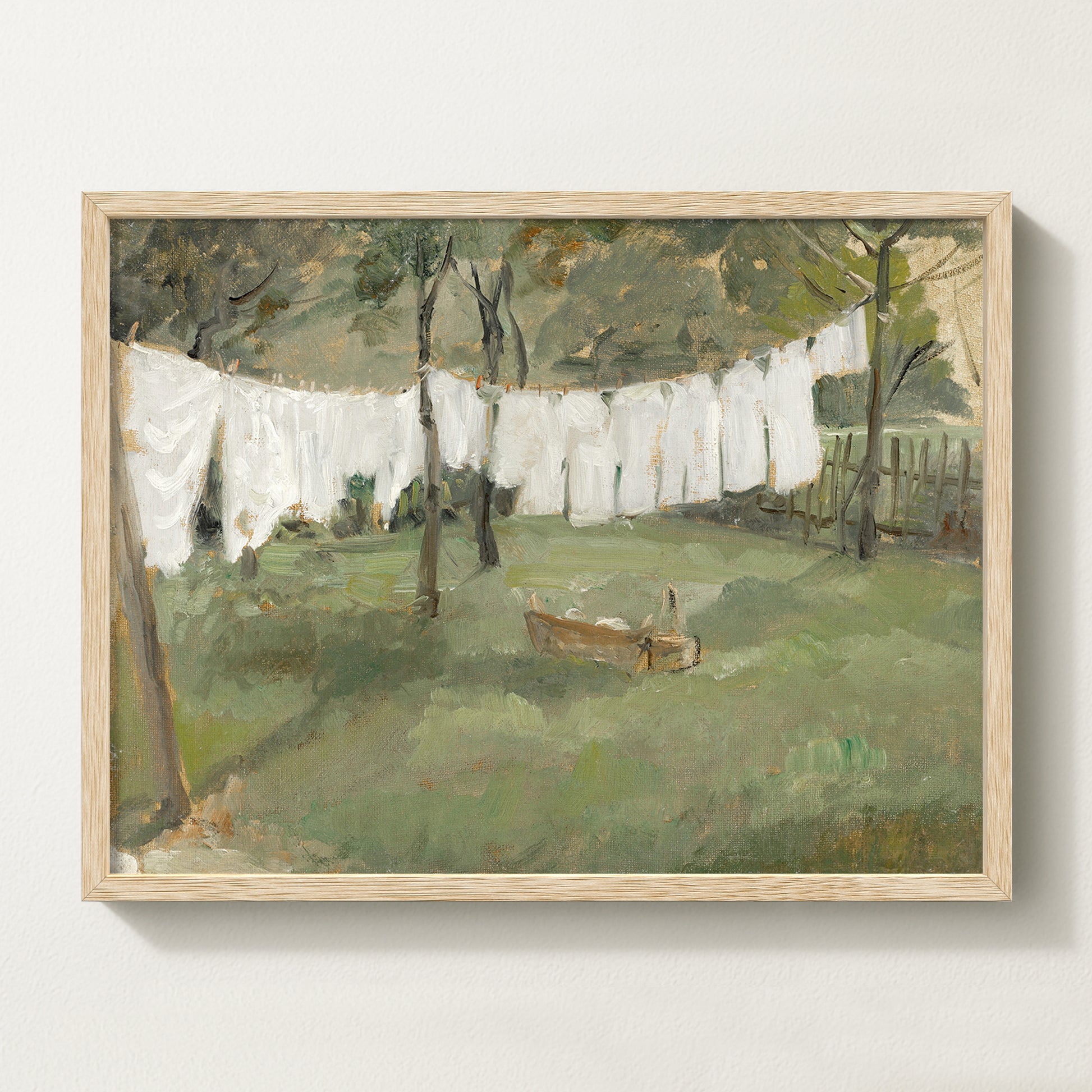 Vintage countryside laundry line wall art in a natural oak frame featuring fresh linens hanging outdoors, ideal for laundry rooms, mudrooms, farmhouse, and cottage interiors.