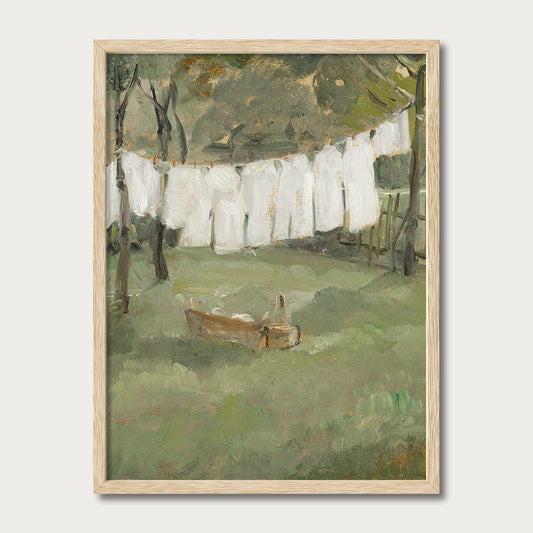 Vintage laundry line garden scene art print with white linens hanging outdoors, available unframed or with oak frame — Avery Home.
