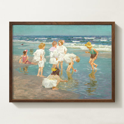 Framed vintage kids beach scene art print featuring children in white clothing playing by the shore with waves in the background.