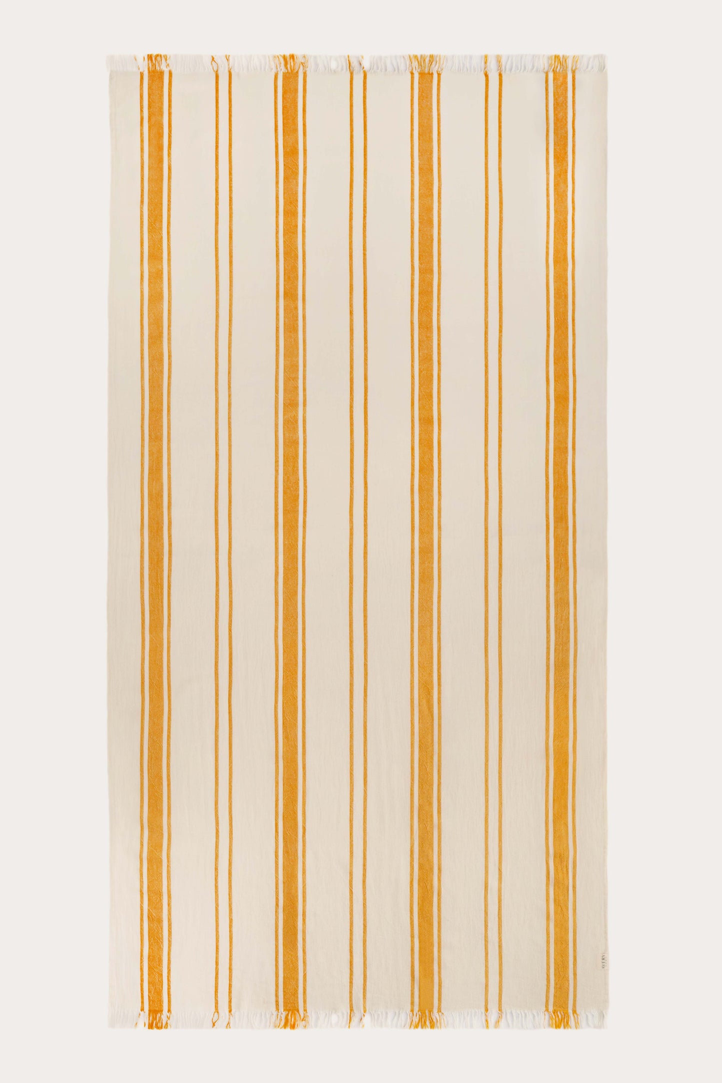 Yellow beige Amalfi Turkish towel in 100% cotton with Cabana stripe pattern and flat weave, midweight and fast-drying by Avery Home

